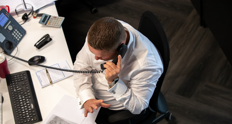 Chase blue loans team member taking a customers call